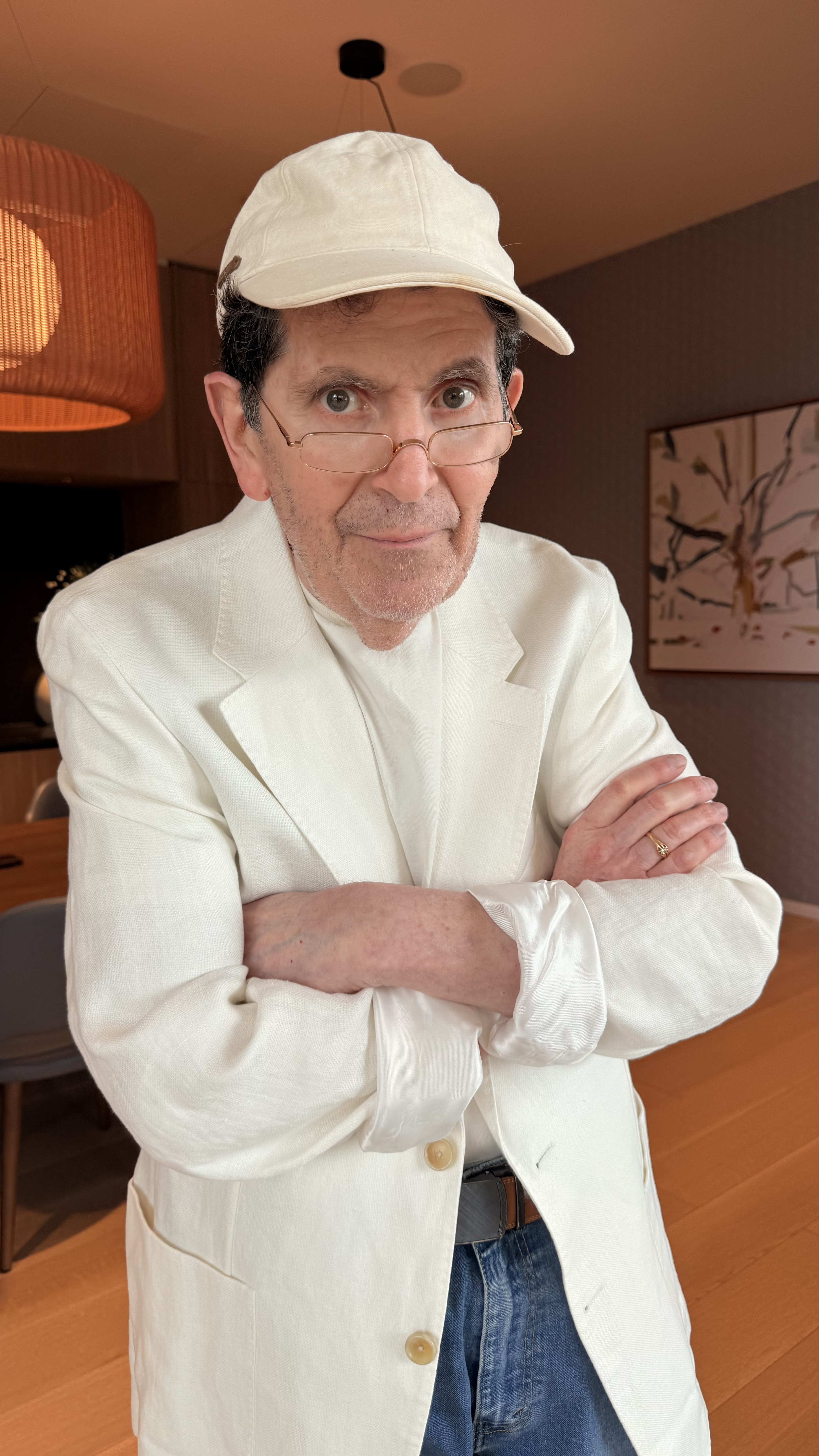 Englishman Mike in white blazer and cap